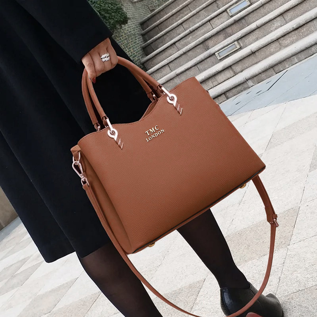 Tan top handle crossbody handbag